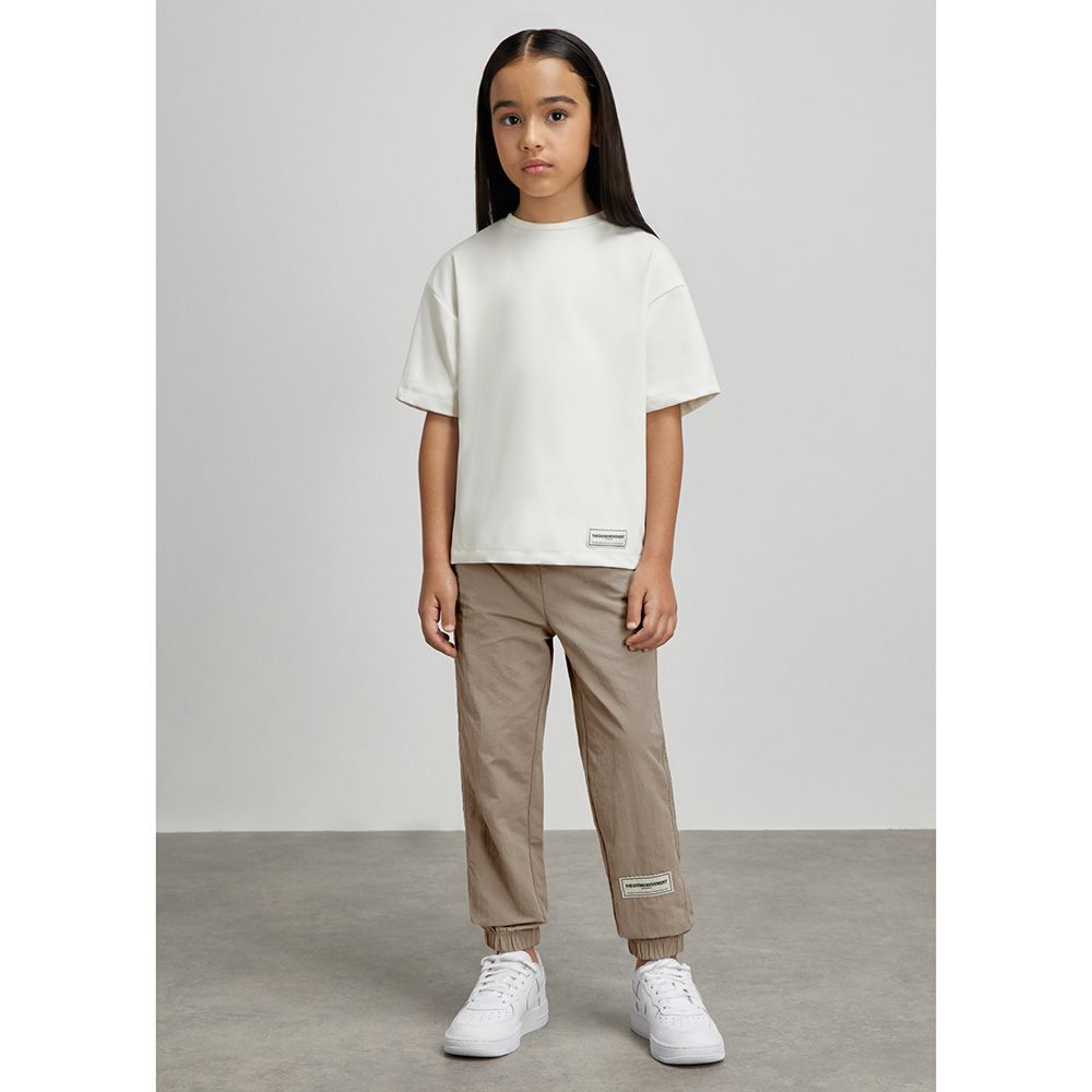 The Giving Movement - Kids Recycled Nylon Joggers - Mushroom