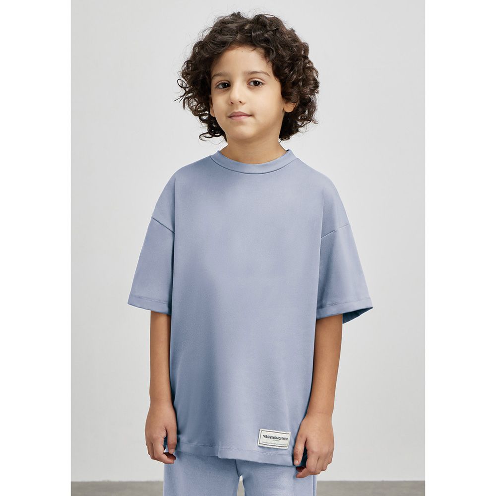 The Giving Movement - Kids Oversized T-Shirt - Powder Blue